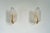 Pair of Mid-Century Hollywood Regency Murano glass leaf wall sconces in thick, clear graniglia glass and polished brass,...