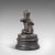This is an antique putto statue. A French, bronze seated cherub figure with small bird in hand, dating to the late 19th...