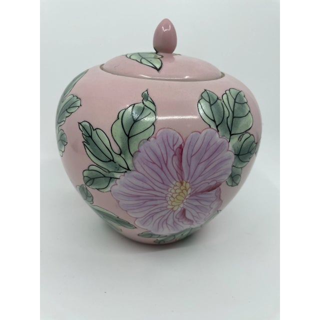 Pink ginger jar with green large leaves and pink flowers. Hand painted! Great for display!