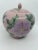 Pink ginger jar with green large leaves and pink flowers. Hand painted! Great for display!