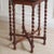 This elegant side table was created around 1890, drawing on Baroque design elements, particularly the characteristic...