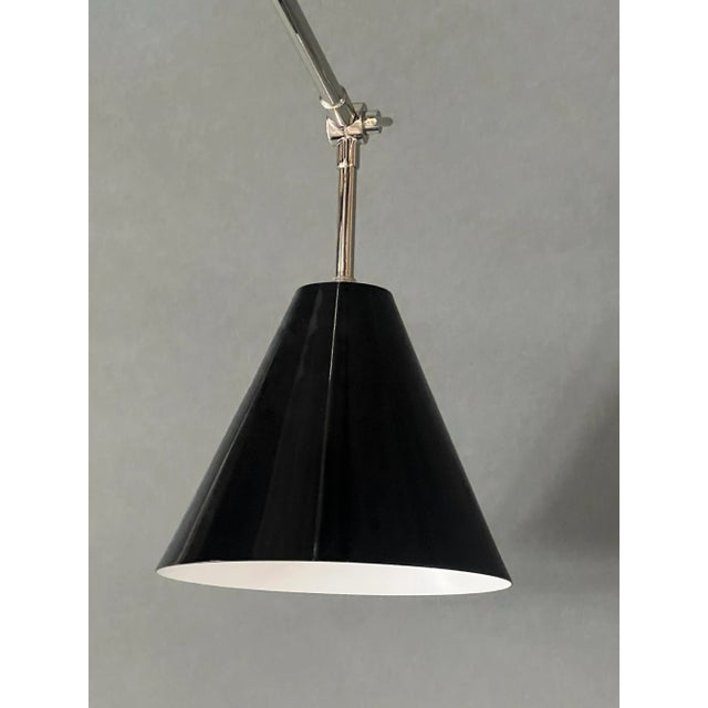 Sinatra Suspension Light from Delightfull, in Very Good conditions. Designed from 2000 I have official proof of...