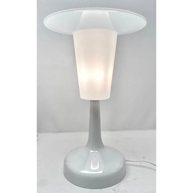 Classic compact design by Rosenthal, this spotlight desk lamp was produced by Rosenthal The stand is White Porcelain the...