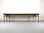 An impressive and rare teak dining table (model 201) by Arne Vodder for Sibast. The table captivates with its elegant,...