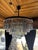 Show stopping 32" Round Odeon Chandelier on a welded iron frame. This RH X Timothy Oulton chandelier was inspired by the...