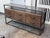 Design Plus Gallery presents a Console Table from Bassett Furniture. The console combines industrial character with...