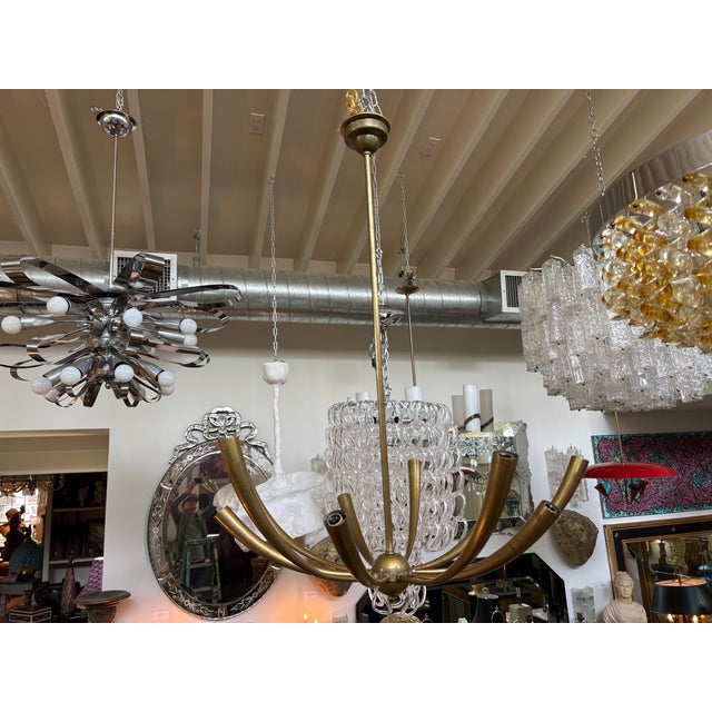 Italian Modern Brass Chandelier. Offered is a beautiful 10 arm brass mid-century Italian brass chandelier that has been...