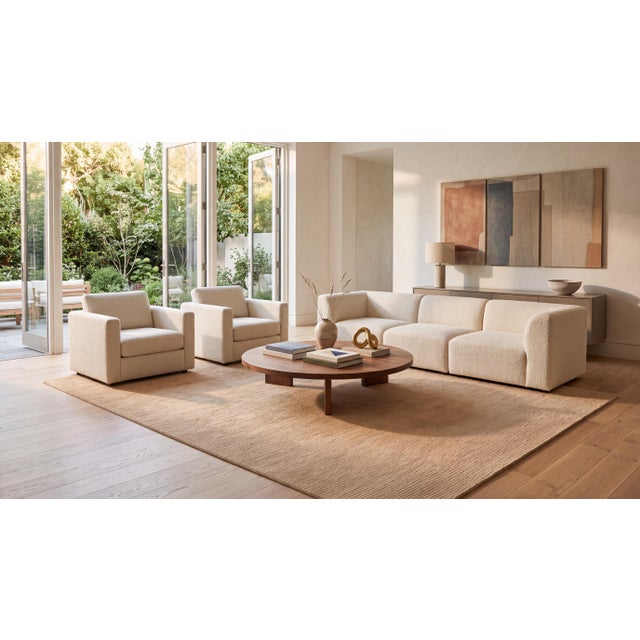 Elevate your space with this exquisite contemporary wool area rug, crafted to bring warmth, rich texture, and refined...