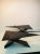 Interesting Triangle Form Bent Wood Design Tables With X Base. Top Work Joinery Ia Accented at Top of Table where The Base...