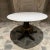 AMBIANIC presents Dining Table new White Marble Top Sculptural Base Base is mahogany wood and iron, finished with gilt-...