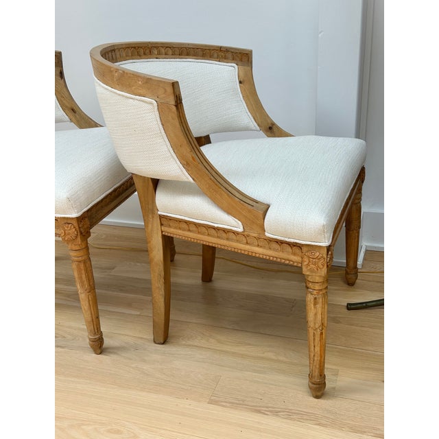 Mid-century French chairs in klismos style with comfortable curved back. Probably beech (standard French wood used to make...