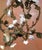 Early 20th C. French Four-Light Floral Tole Chandelier With Porcelain Flowers For Sale - Image 10 of 10