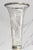 Dating to circa 1915, this elegant antique vase is a striking marriage of finely etched glass and substantial sterling...