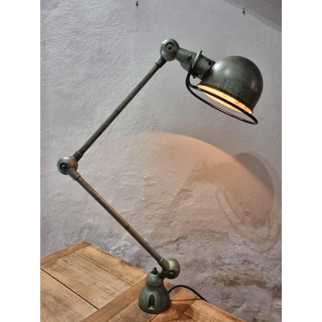 This authentic vintage Jieldé workshop lamp from the 1950s is a true icon of French industrial design. Originally built...