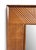 Richly toned wood statement mirror showcasing a geometric carved pattern with linear details. Its Generously sized square...