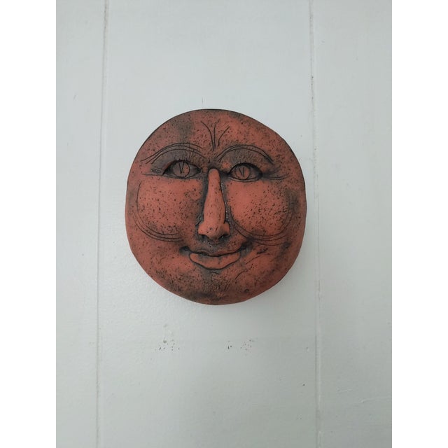 Here's a really fun wall.pocket by an unknown artisan possibly of Japanese origin circa 1960s. It feature a terra cotta...