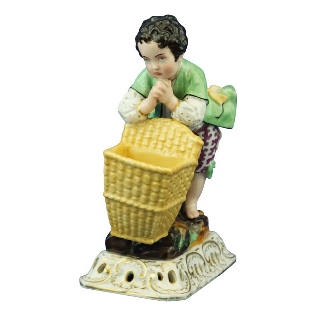 Early 19th Century Porcelain Figurine of Child with Basket by Jacob Petit, France For Sale