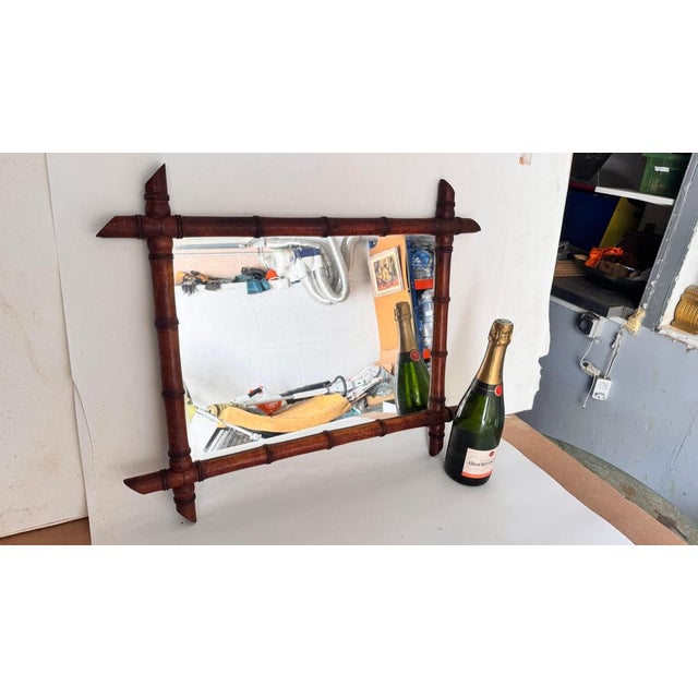 Faux Bamboo Mirror – French Design – Circa 1940 : This is a vintage wall mirror in the style of faux bamboo, crafted in...