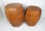 A pair chic complimentary sized faux leather octagonal table storage containers featuring decorative bronze tacks on...