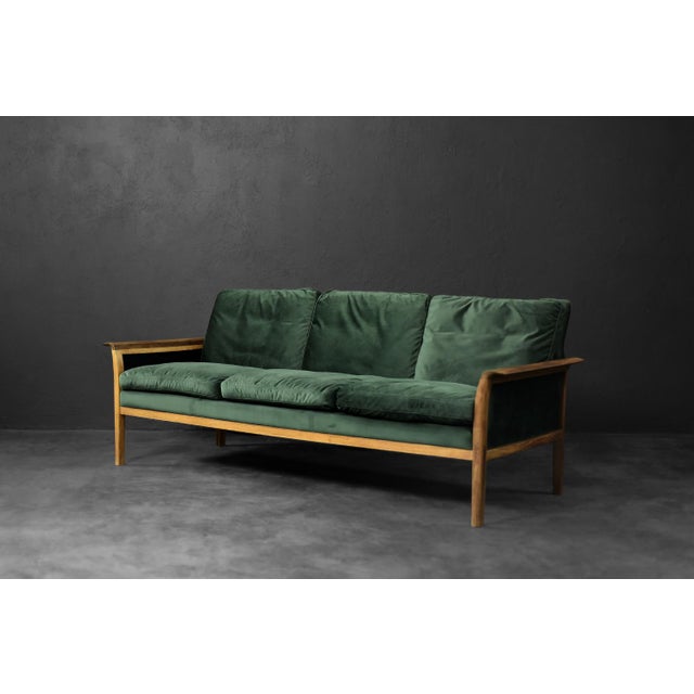 This elegant lounge set comprising a three-seater sofa and an armchair was designed by Knut Sæter for the renowned...