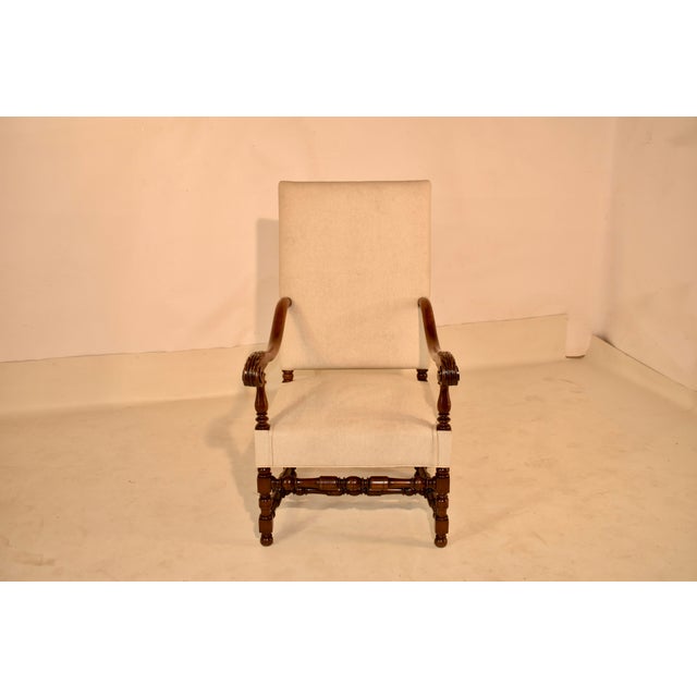 19th century walnut Flemish arm chair from France. This is a lovely Flemish armchair made from walnut and newly...