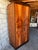 Exceptional Art Deco armoire / wardrobe of beautifully compact proportions, likely European in origin. The spectacular...
