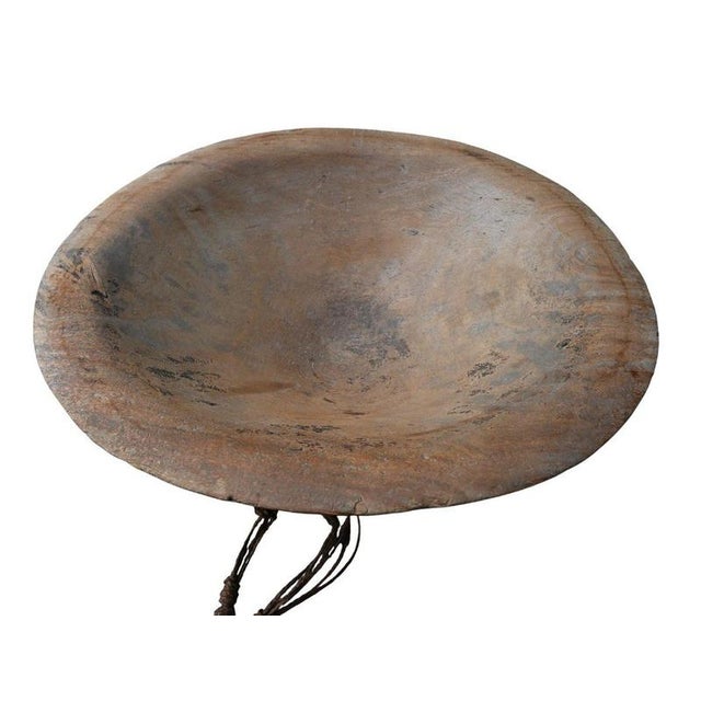 Period: 19th century Style: Tribal Art Condition: Good condition Material: Solid wood Diameter: 65 cm Impressive...