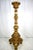 A large pair of continental carved, gilt torchers, 20th century. H 60 in. X w 21 in. X d 12 in. H 152.4 cm x w 53.34 cm x...