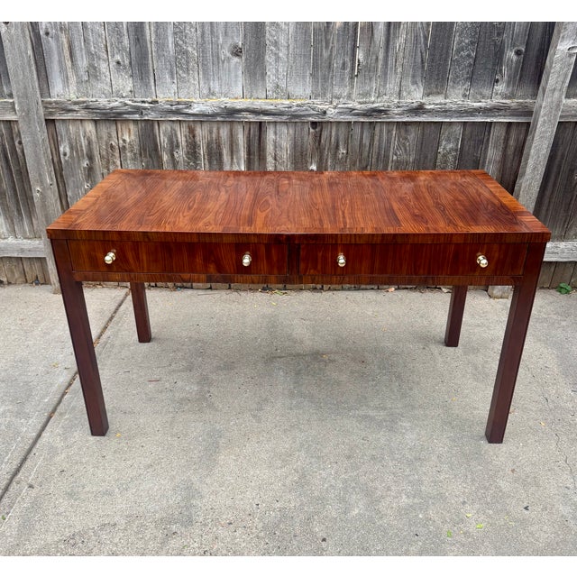 Amazing Thomas O'Brien desk for Hickory Chair featuring Santos Rosewood veneers and mahogany solids. Two drawers with...