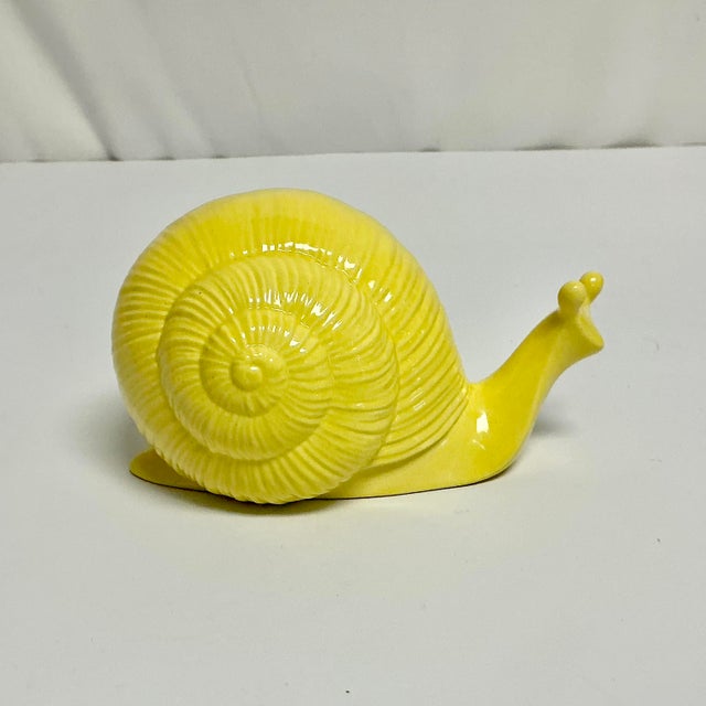 Whimsical, Regal and a sheer delight. This Mid-Century Folk Art Ceramic Snail will delight your guests and make you smile....
