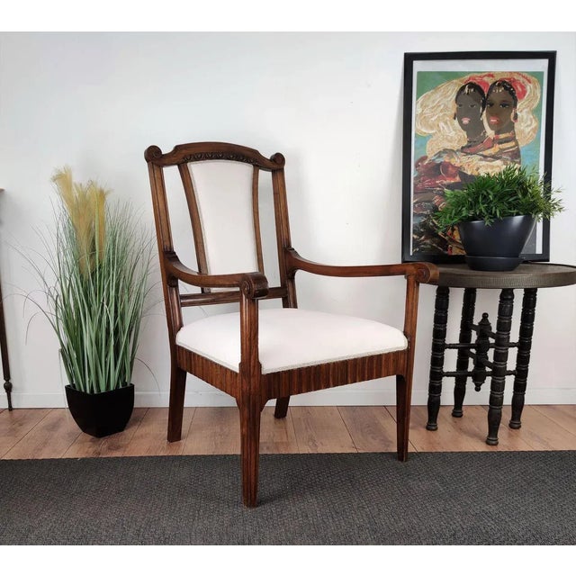 Beautiful Italian carved walnut wood armchair in good conditions and fully newly upholstered in white fabric with very...