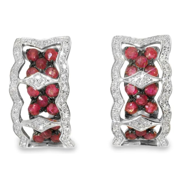Beautiful 14K Pink Rose Gold Diamond Ruby Flower Huggie Earrings These exquisite 14K pink rose gold earrings are designed...