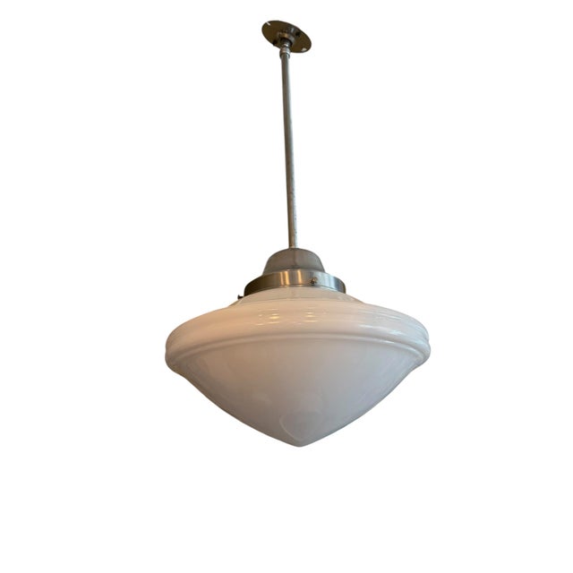 We have 3 of these! This is a vintage Art Deco-style schoolhouse pendant light featuring an opaque white milk glass shade...