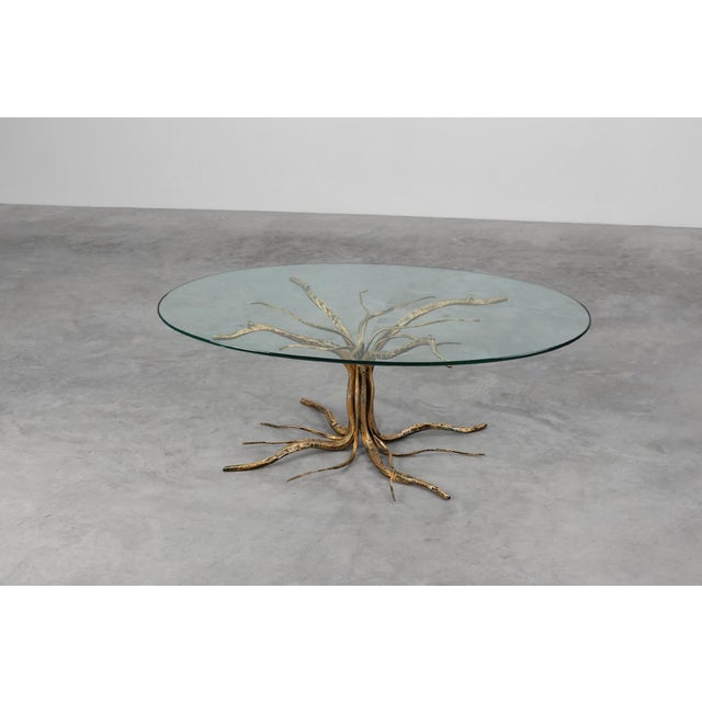 This sculptural mid‑century coffee table by Salvino Marsura captures the unmistakable energy of Italian artistic metalwork...