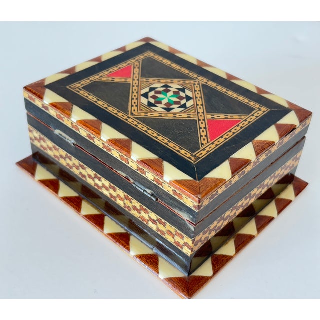 Spanish Moorish Marquetry Walnut Trinket Box, Granada, circa 1940 An exquisite and highly decorative Spanish marquetry...