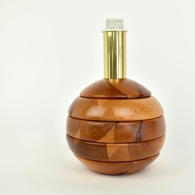 Rare wooden table light, made in Germany in the 1970s. This base consists of stacked solid pine wooden discs, resulting in...