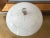 Elegant modern frosted glass flush mount ceiling light with central transparent sunburst topped by a blue polka dotted...