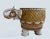 Vintage European hand painted and glazed terracotta decorated elephant planter. Great coloration and craquelure in the...