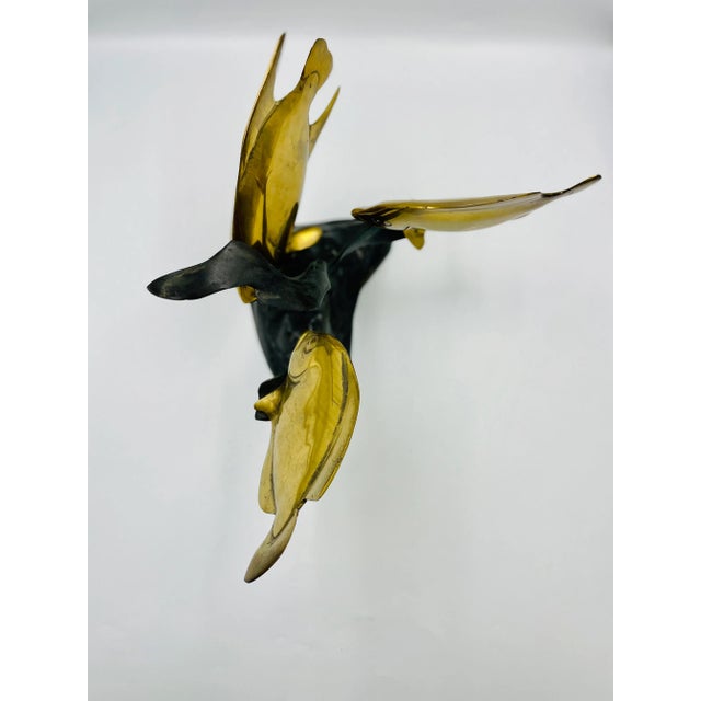 This is a wonderfully evocative and sleekly detailed brass/bronze statue with a modernist flare. The thoughtful design of...