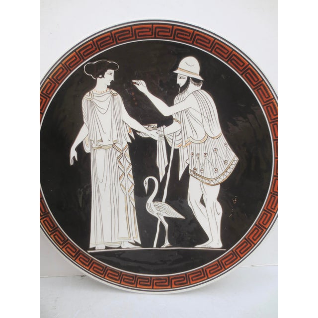Greek Revival Porcelains, a large serving platter and tall vase. Both painted in classic Red and Black Amphora style....