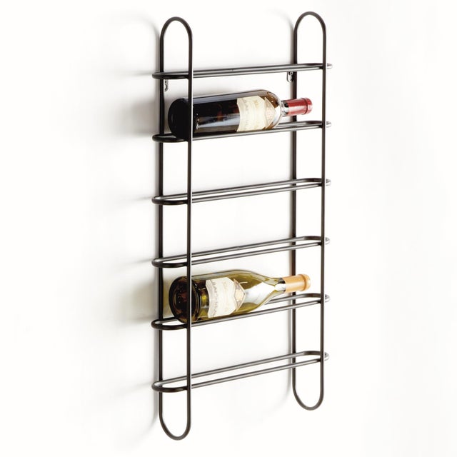 Clean and modern, this updated design is made of round metal stock. It effortlessly showcases your favorite six bottles. A...