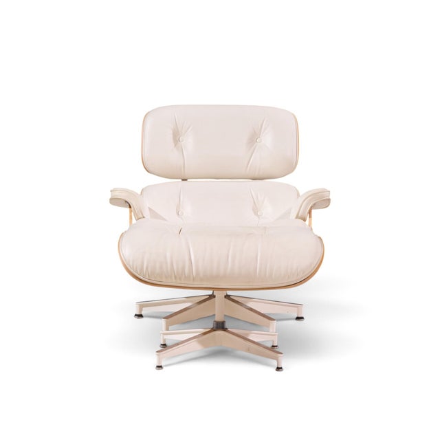 Charles and Ray Eames for Herman Miller Mid Century White Oak Eames Lounge Chair and Ottoman The chair measures: 33 wide x...