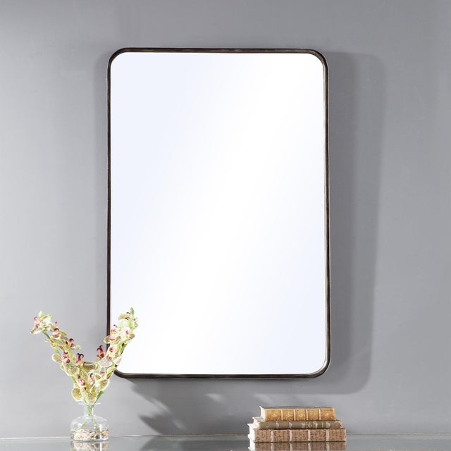 The rounded corners of this metal frame give a softer look and uniqueness. It is finished in a dark bronze with gold...