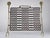 Brutalist fireplace screen by David Marshall, crafted in bronze with a spectacular central wrought ironwork of...