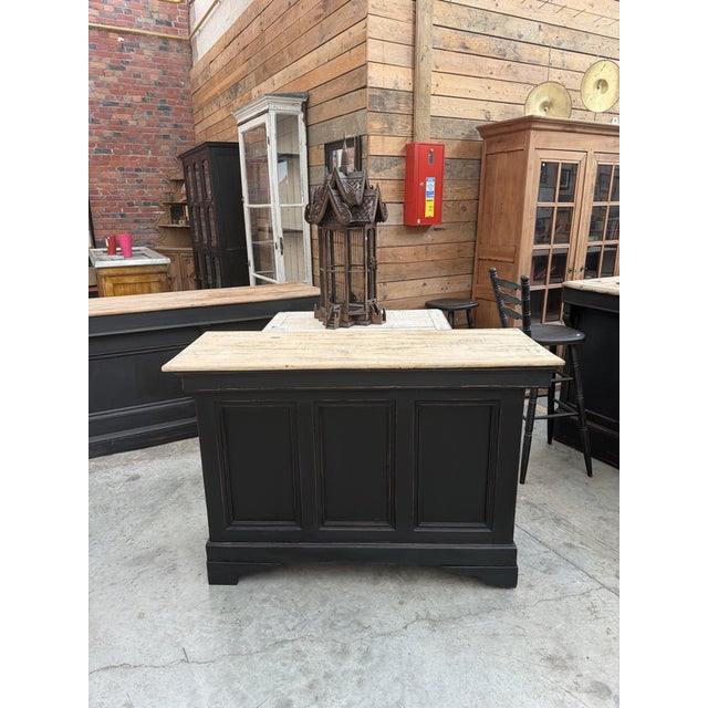 This counter has been completely restored. It features a functional drawer at the back (no key included) and ample storage...