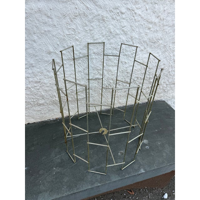 Vintage metal lamp shade comprising of metal rods welded together creating a geometric form. There are no makers mark on...