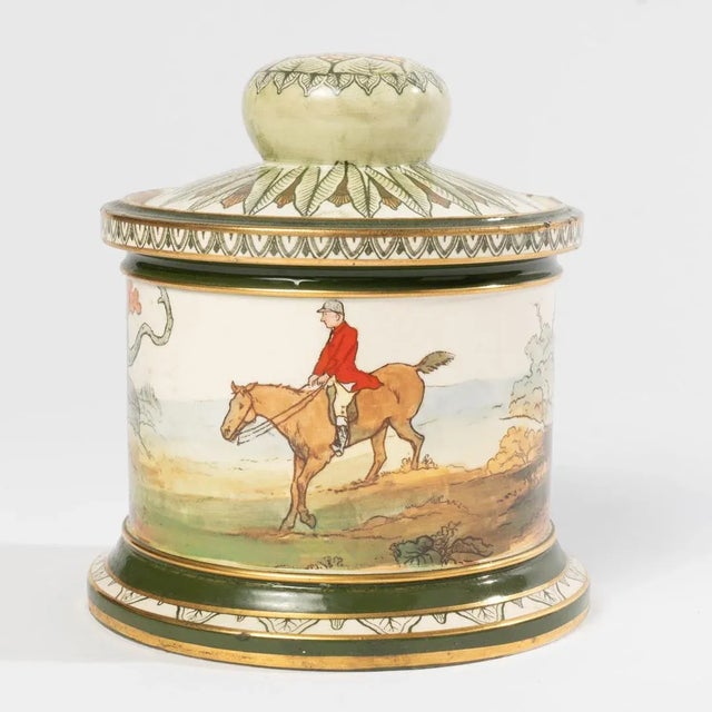 Royal Doulton is one of England's most iconic brands. This humidor or tobacco jar depicts a equestrian horse and rider...