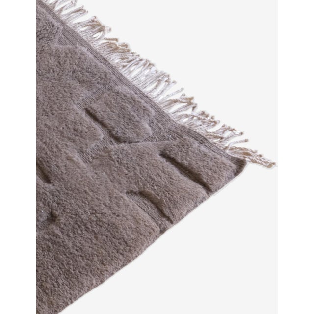 Transform Your Space with a Beni Mrirt Wool Rug This Moroccan Beni Mrirt wool rug is the perfect way to combine luxury,...