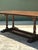 This 19th-century French dining table is a masterwork of rustic elegance, capturing the enduring appeal of the provincial...