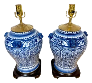 Chinese Export Blue & White Porcelain Exotic Florals & Foo Dog Medallions - a Pair